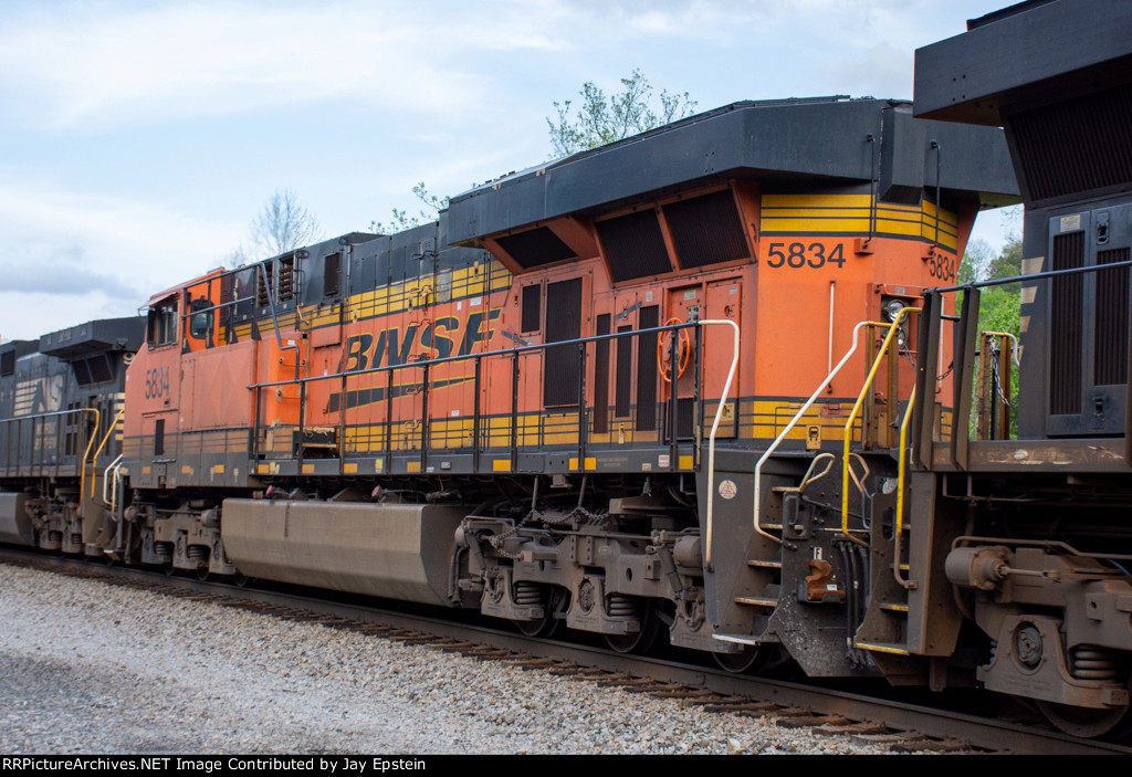 BNSF 5834 trails on 279